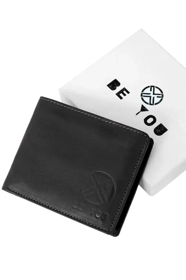 Rear side of handmade men’s leather wallet in textured black finish